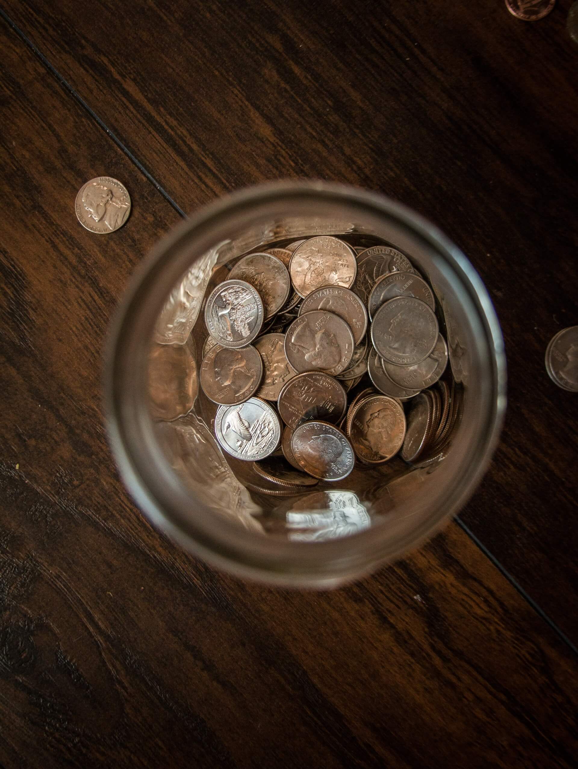 Jar of coins on a table