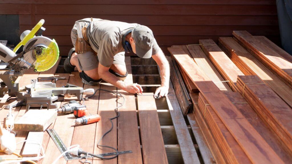 man building deck