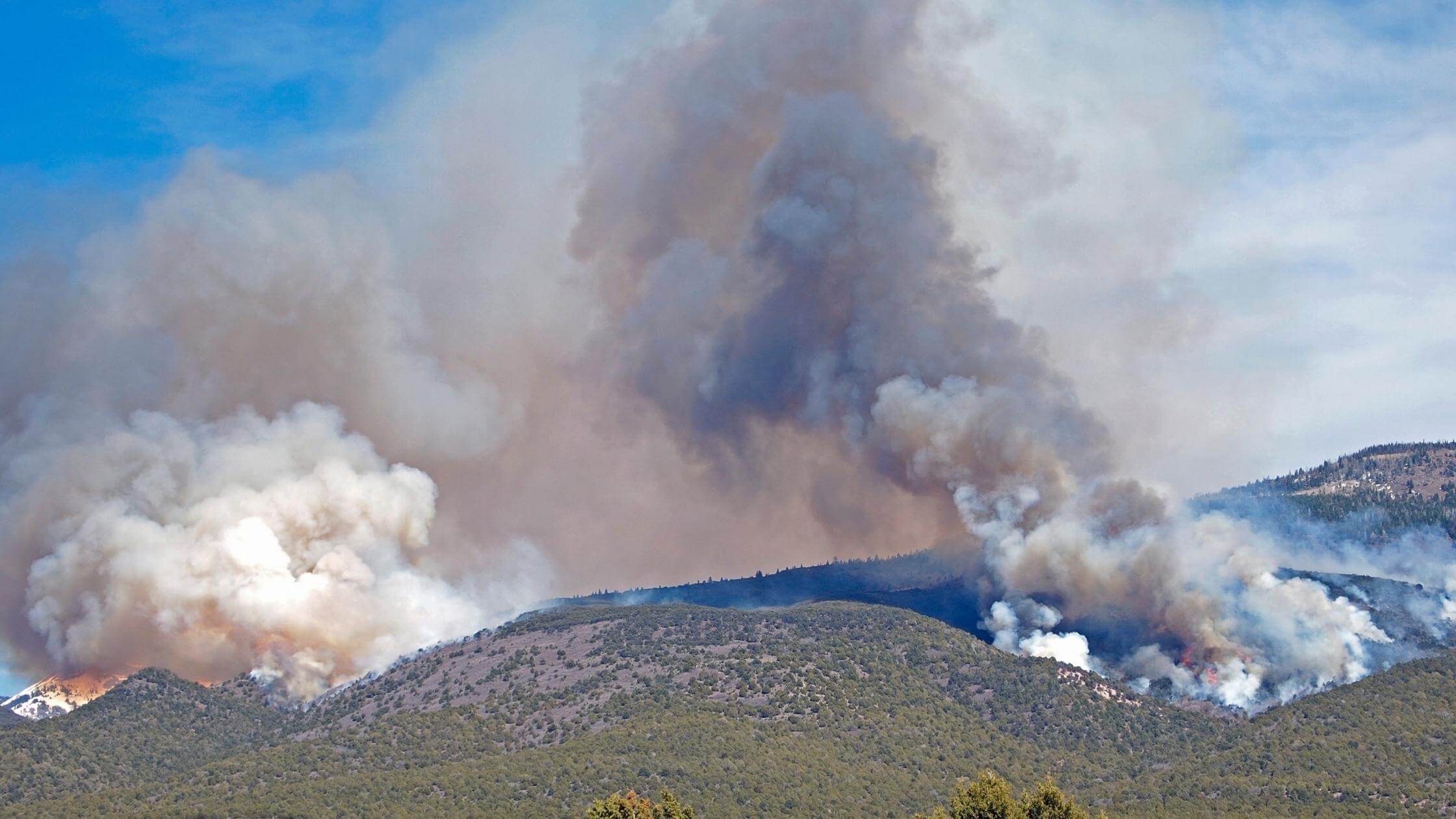 wildfire smoke on hills